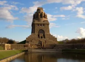 masonry temple with pool in foreground 