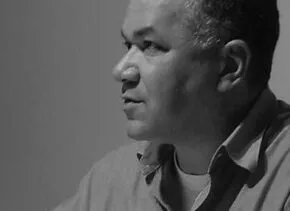 black and white headshot of mark raymond 