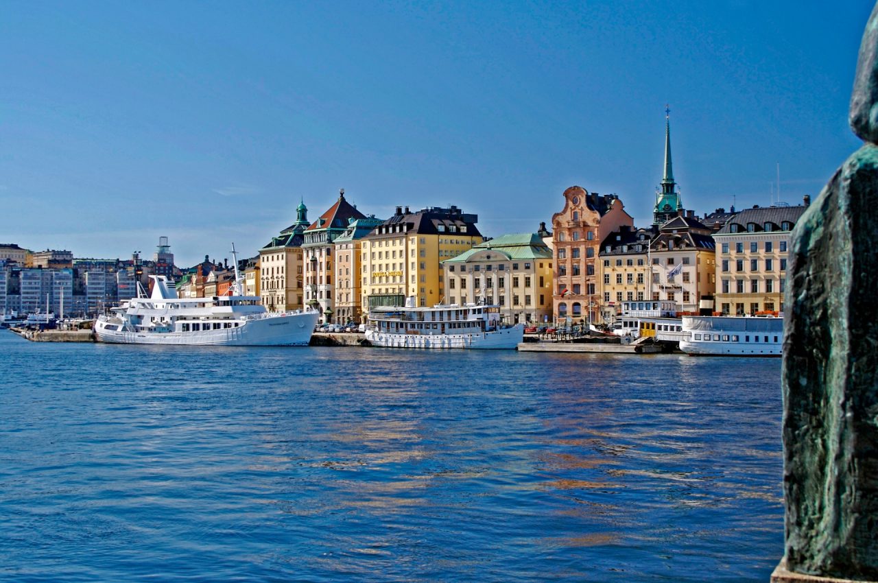 buildings in stockholm with water in foreground 