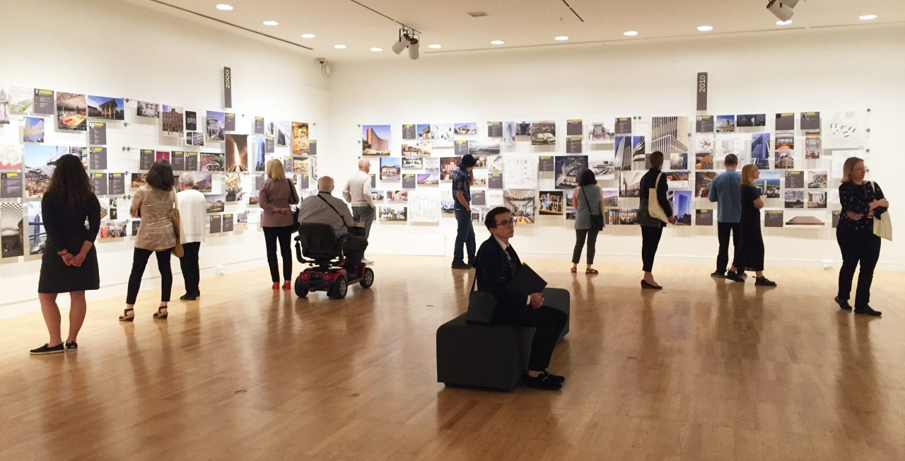 Exhibit visitors at the Krannert Art Museum viewing the women's symposium exhibit 