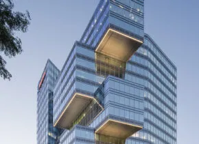 photograph of building with staggered volumes projecting out 