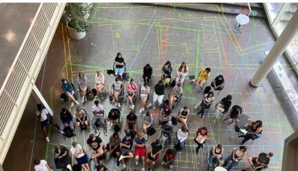 Students and Professor John Clark in Atrium