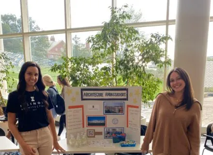 architecture ambassador's standing by a display