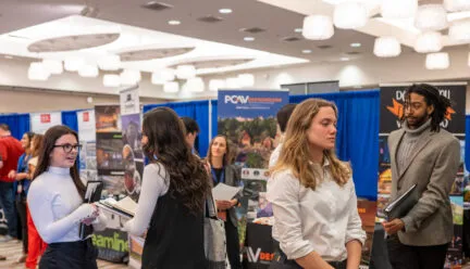 students and recruiters conversing at career xpo 2024