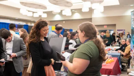 students talking at career xpo