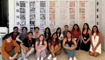 students sitting in front of their work