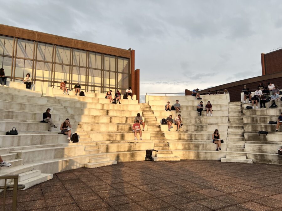 students sitting outside kranner