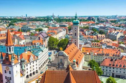 birds eye view of munich, with colorful roofs and towers