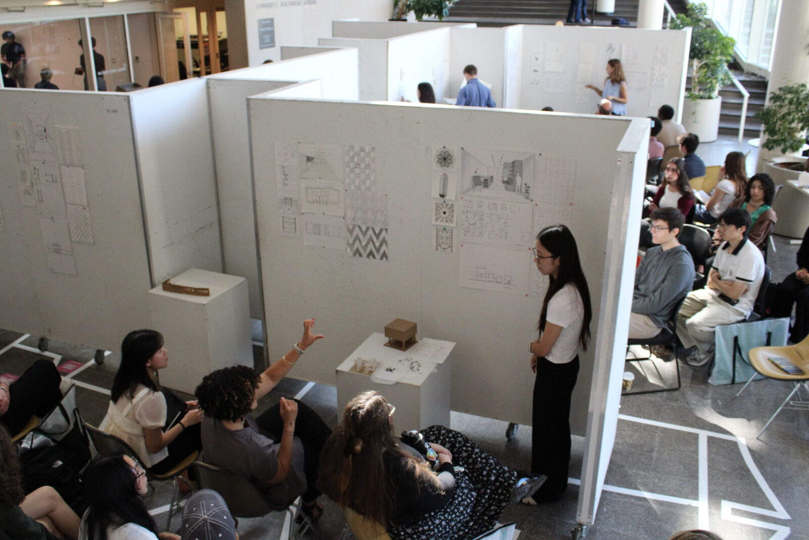 an audience critiquing student projects