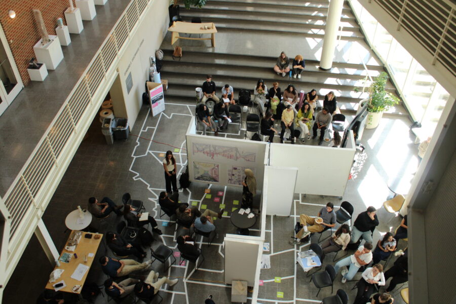 overhead view of atrium with many students