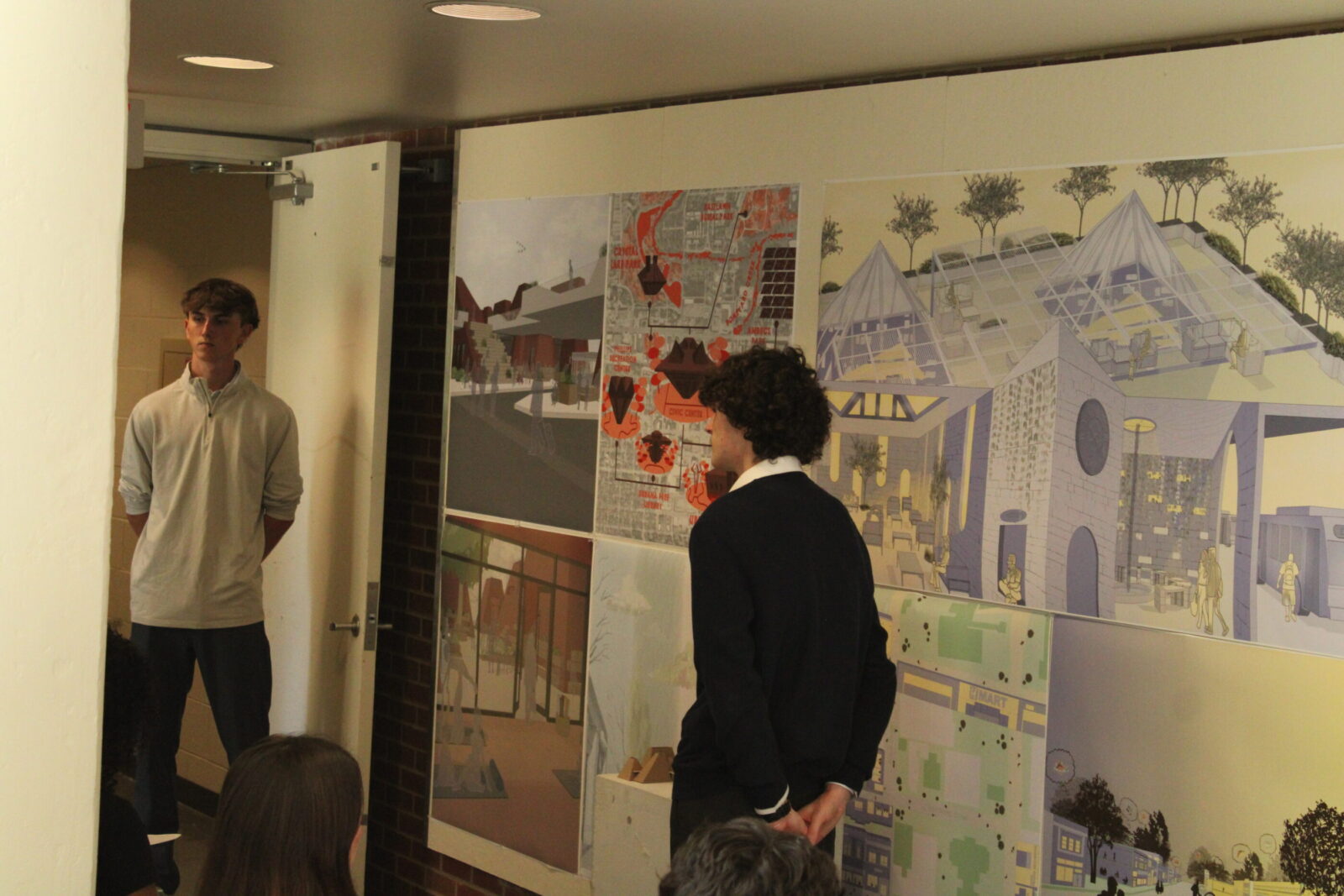 students standing in front of posters