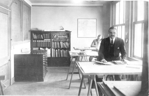 buell at desk black and white pic