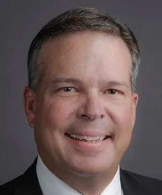 White male with black and grey hair