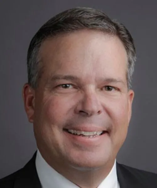 White male with black and grey hair