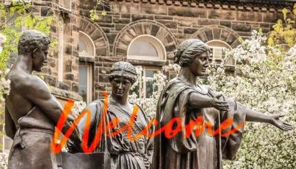 jpg welcome with three brass statues interacting