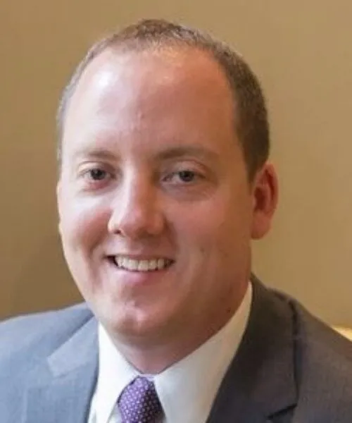 smiling man looking at camera