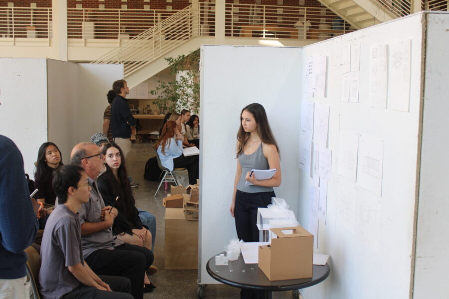 Reviewers giving feedback to student 
