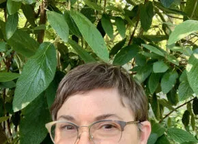 melissa pokorny with green tree in background