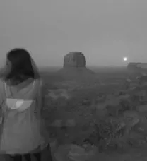 Artfully exposed soft B&amp;W photo of the student in a canyon landscape