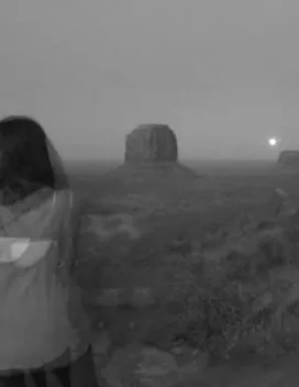 Artfully exposed soft B&amp;W photo of the student in a canyon landscape