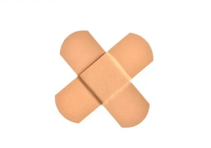 Photo of two bandaids forming an "X"