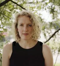 Portrait of the student with foliage in the background