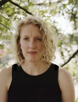 Portrait of the student with foliage in the background