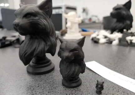 3 3D printed black cat busts made of ABS plastic