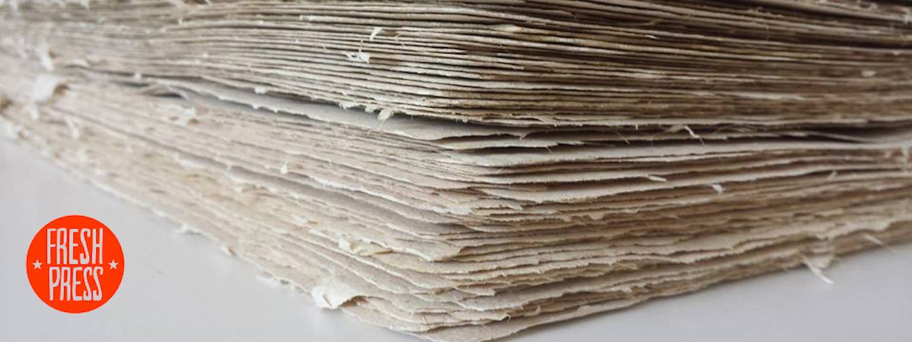 Photo of a stack of natural handmade papers