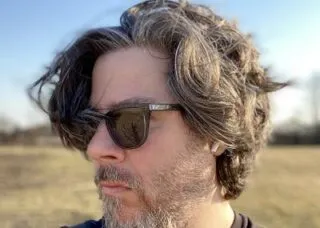 photo of Ben Grosser with black sunglasses looking right