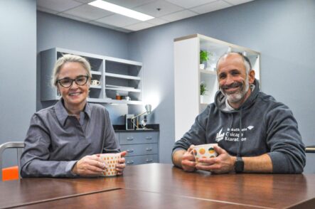 Deana McDonagh and Adam Bleakney at (dis)Ability Design Studio/table w/coffee
