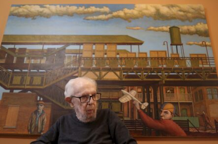 Leo Segedin in front of painting