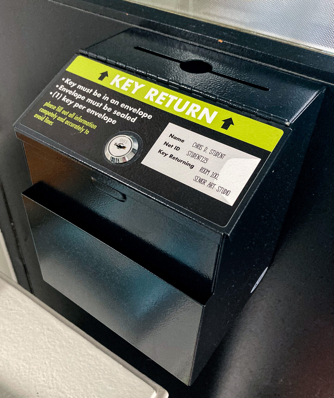 Box labeled with key return information