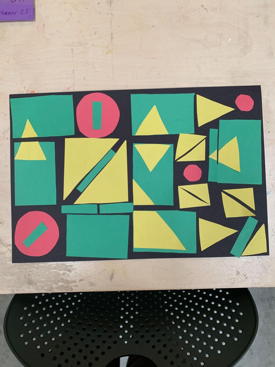 a paper mosaic project with green yellow and red