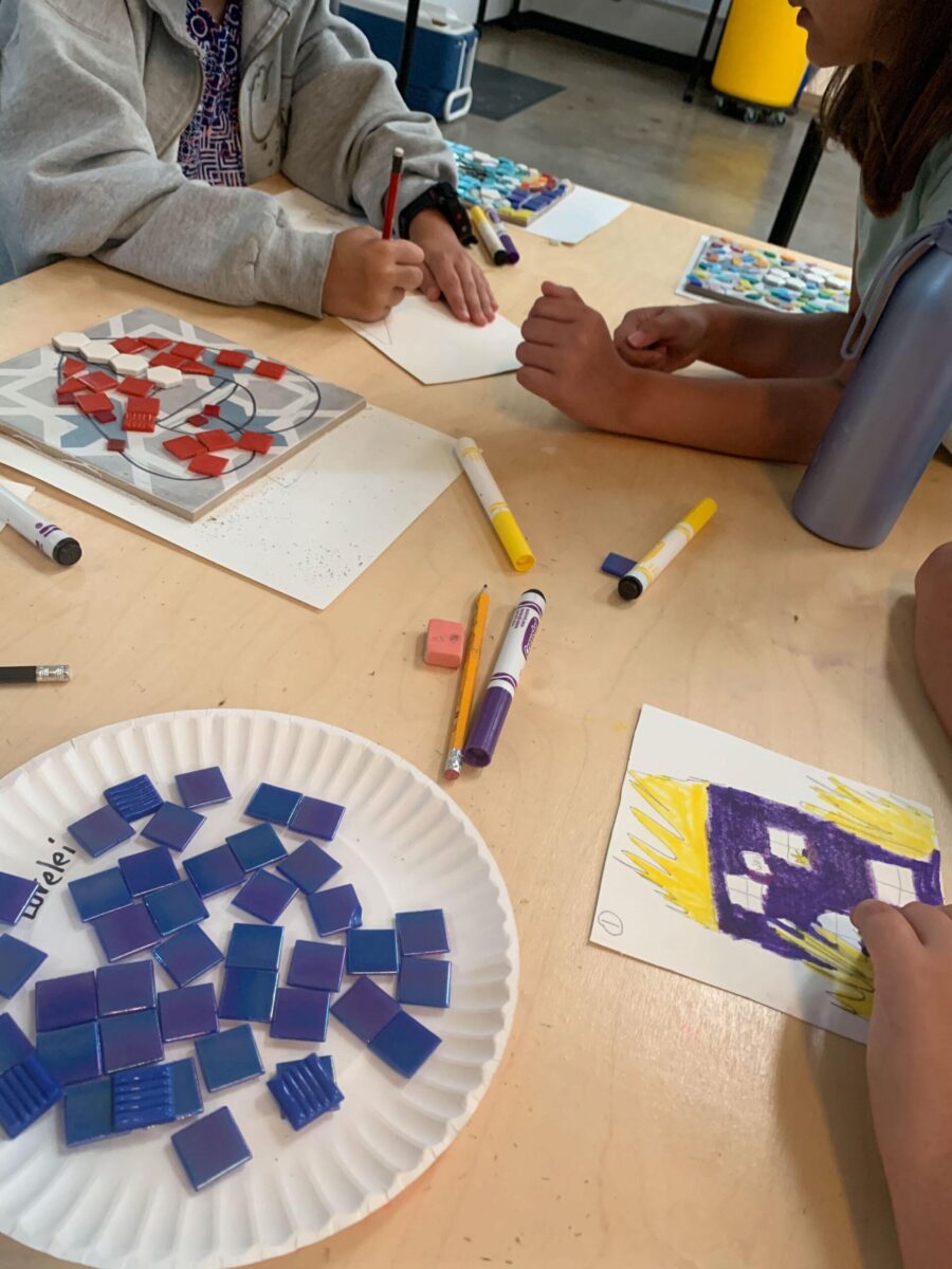 Students working on their mosaic designs