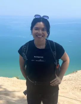 woman standing in front of water