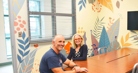 two people sit at a table