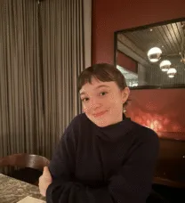 young woman at a table