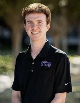 young man in TCU t-shirt