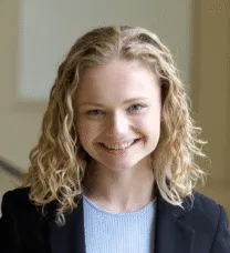 young woman in blue blazer
