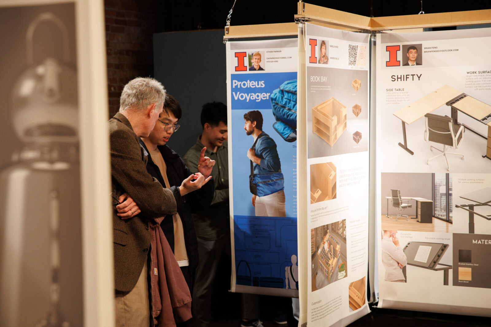 people looking at exhibition