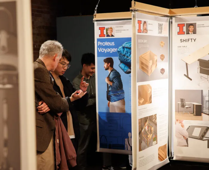 people looking at exhibition