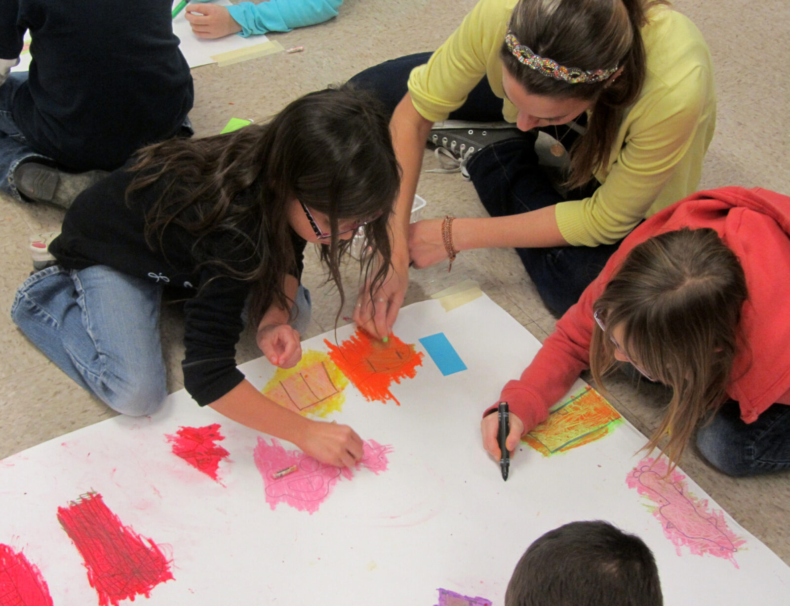 students working on art together