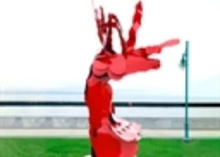 a red sculpture of Ruth Aizuss Migdal