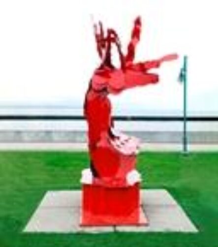 a red sculpture of Ruth Aizuss Migdal