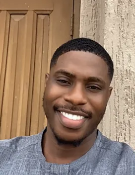 young man in blue shirt