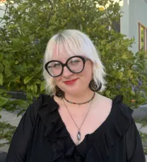 young woman with glasses