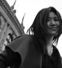 black and white image of young woman with black hair