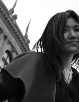 black and white image of young woman with black hair