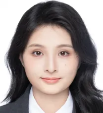 young woman with long black hair wearing a tie